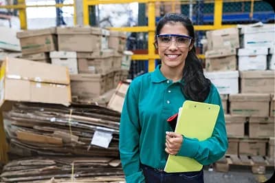 Lady doing a free audit on a waste stream